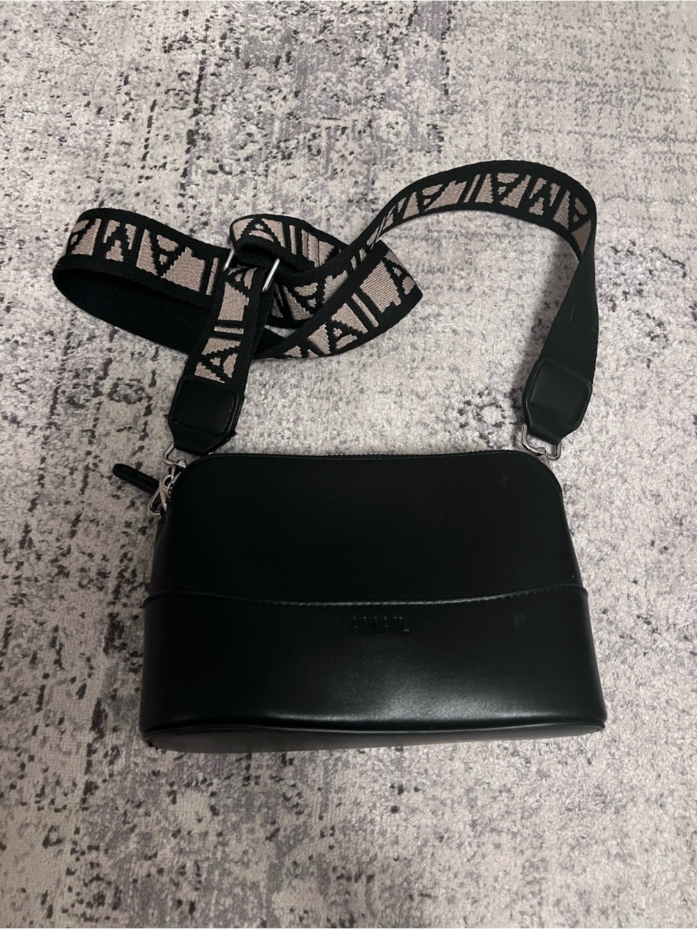 Black Womenโs Crossbody Bag with Patterned Strap